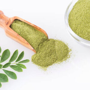 Fresh leaves and moringa powder moringa oleifera. top view